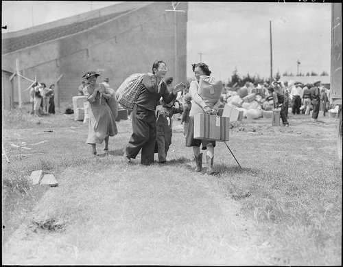Salinas, California. Members of two evacuee families of Japanese ancestry meet at this assembly cen . . . - NARA - 536183