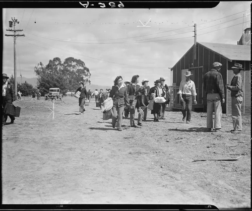 Salinas, California. A family of Japanese descent arrives at this assembly center prior to transfer . . . - NARA - 536185
