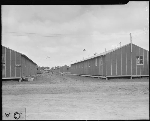 Salinas, California. Looking between two rows of Barracks at the Salinas Assembly center. - NARA - 536179